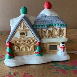 Festive Holiday Village House with Snowman